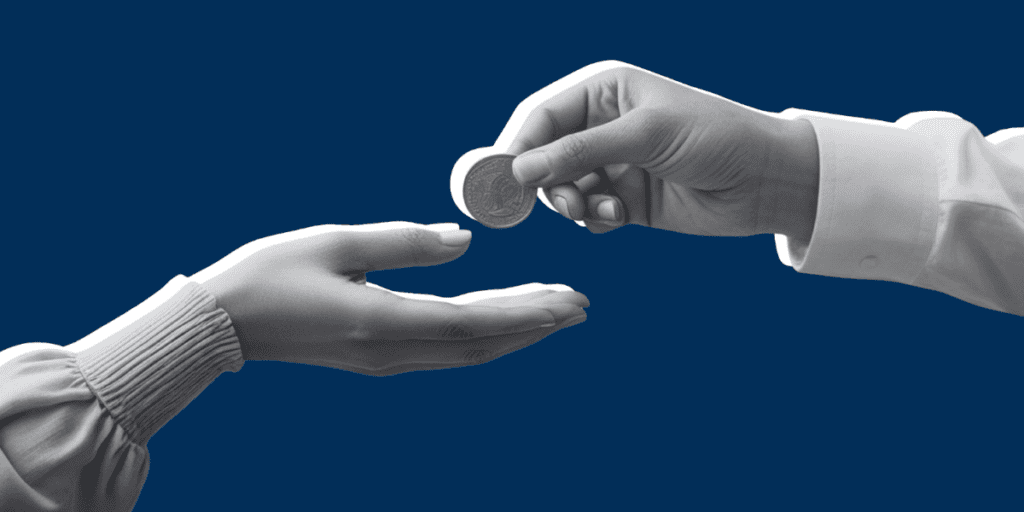 A person hands a coin to another person who is reaching out to receive it, symbolizing wealth transfer, set against a solid blue background.